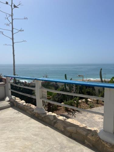 a view of the ocean from a balcony at Villa Jardin De l'Ocean in Aourir