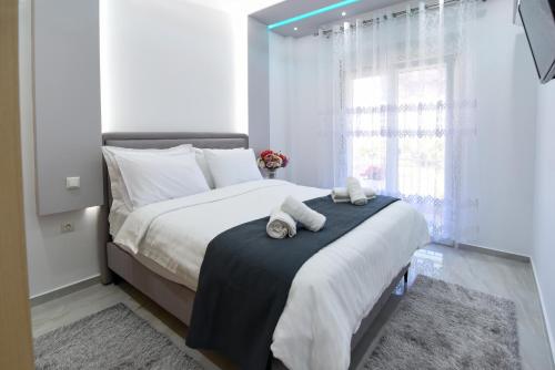 Ένα ή περισσότερα κρεβάτια σε δωμάτιο στο SunShine apartment