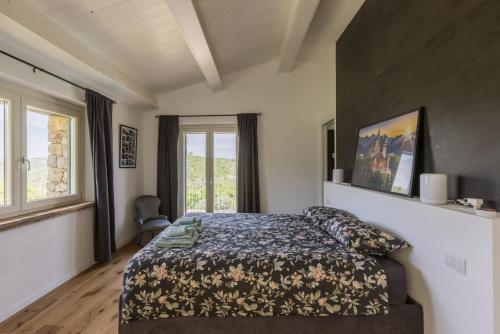 Postel nebo postele na pokoji v ubytování Villa Alessandra