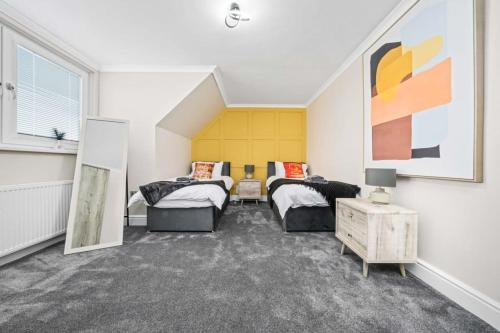 Ένα ή περισσότερα κρεβάτια σε δωμάτιο στο Central Gretna Luxury 4 bed