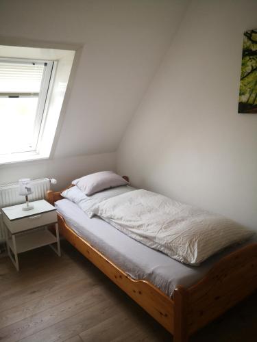 Postel nebo postele na pokoji v ubytování Apartments - Privatstall am Berghof