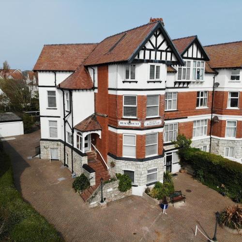 an aerial view of a large brick building at Beachmount Holiday Apartments in Colwyn Bay