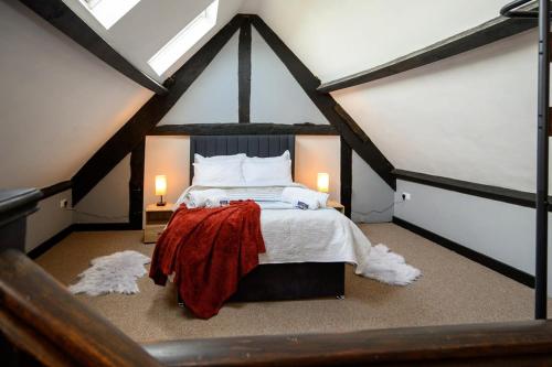 Krevet ili kreveti u jedinici u okviru objekta The Cottage by StayStaycations