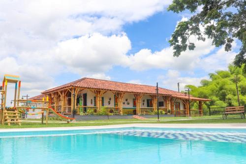 Der Swimmingpool an oder in der Nähe von Casa Saman by tesorito fincas exclusivas