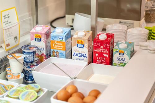 a counter with eggs and other food items on it at On The Rock in Arco