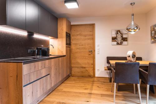Η κουζίνα ή μικρή κουζίνα στο Spa Apartments - Summercard included - Zell am See