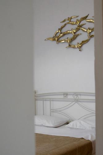 Ένα ή περισσότερα κρεβάτια σε δωμάτιο στο Blue Star Sea Apartment