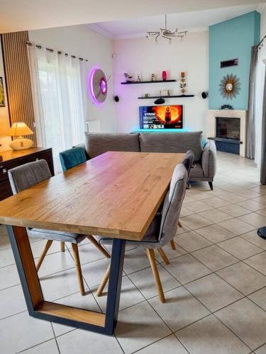 Photo de la galerie de l'établissement L'Orée du bois de Chigny - Maison pour 6 à Disneyland Paris, à Chanteloup-en-Brie