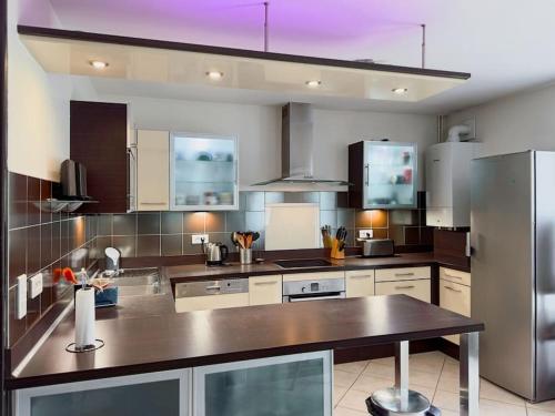 Photo de la galerie de l'établissement L'Orée du bois de Chigny - Maison pour 6 à Disneyland Paris, à Chanteloup-en-Brie