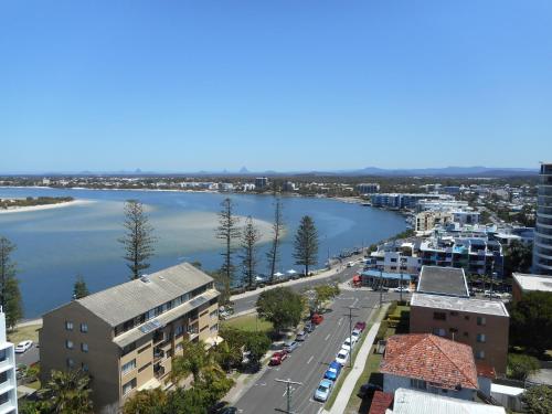 arial view of a city with a body of water at The Waterford Prestige Apartments in Caloundra