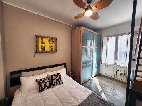 Ένα ή περισσότερα κρεβάτια σε δωμάτιο στο Nido felice