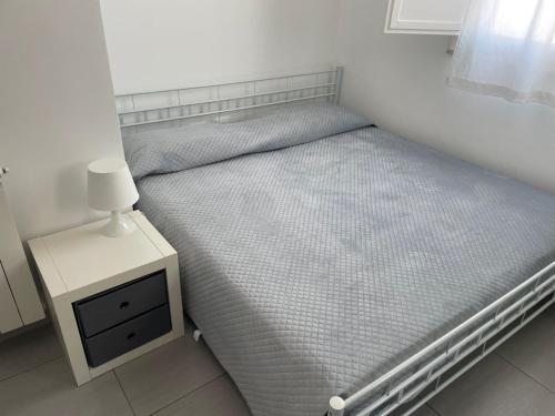 Ein Bett oder Betten in einem Zimmer der Unterkunft Via Itria