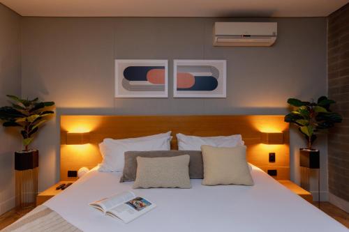 Una cama o camas en una habitación de Loma Verde Aparthotel