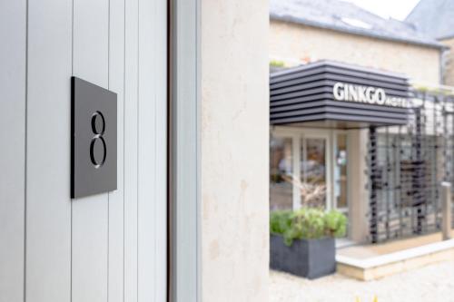 a close up of a window of a store at Hôtel Ginkgo - SPA Biloba in Quimper
