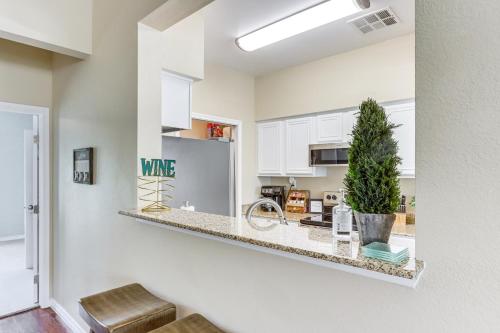 a kitchen with white cabinets and a counter at Pool and Lake Access Lovely Monkey Island Getaway in Afton