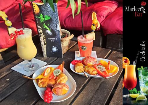 Ποτά στο Marleen`s Bar und Zimmer