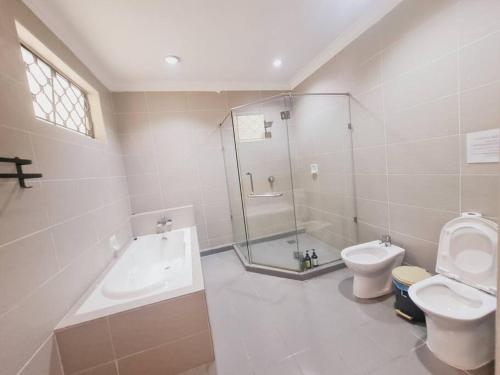 Ванна кімната в Bali Modern Style Villa up to 20pax in KL