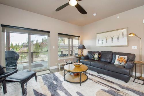 a living room with a couch and a table at Rendezvous 47 Lookout Point in Fraser