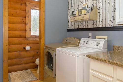 a laundry room with a washer and dryer at 2665 Golden Edge Drive in Kremmling