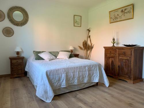 Postel nebo postele na pokoji v ubytování Maison 5mn de la mer