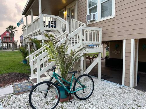 a bike parked in front of a house at Key Largo Surfside Beach, Texas in Freeport