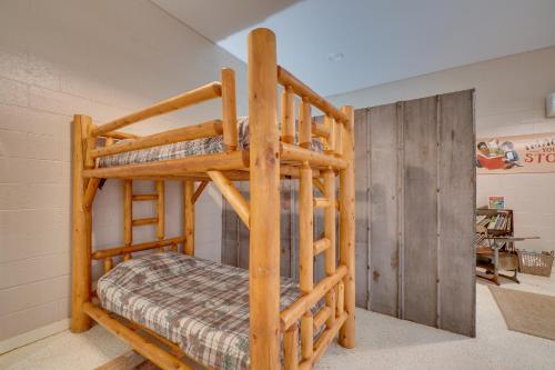 a wooden bunk bed in a room at Riverfront Briceville Studio Apt ATV, Hike and More 