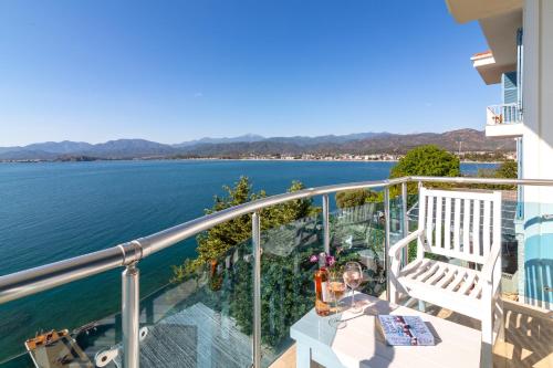 a balcony with a view of the water at Sofia Ada in Fethiye