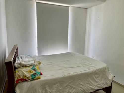 Ein Bett oder Betten in einem Zimmer der Unterkunft casa- festival vallenato
