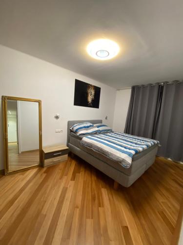 Ένα ή περισσότερα κρεβάτια σε δωμάτιο στο NeicApartmentLandskron 1010