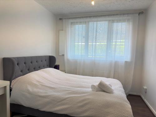 Downtown Delightにあるベッド