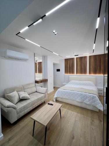 Postel nebo postele na pokoji v ubytování Aria's Apartments