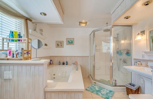 a bathroom with a shower and a sink at Hernando Beach Home on Dolphin Cove Dock and Kayaks in Hernando Beach
