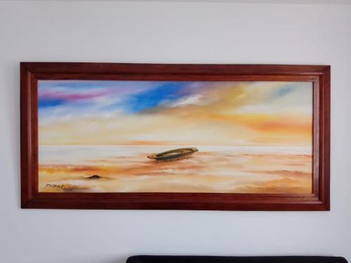 a painting of a painting of a rock on a wall at Edificio Tony - Alojamiento Aparta-Hotel in Barrancabermeja