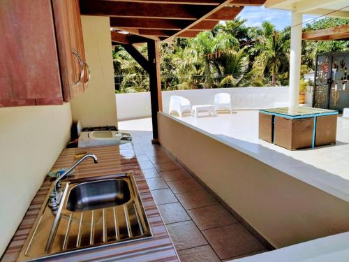 Photo de la galerie de l'établissement Okaina Studio Rooftop, à Cabarete