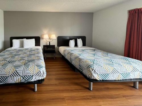 Ένα ή περισσότερα κρεβάτια σε δωμάτιο στο Motel 6-Butte, MT - Historic City Center