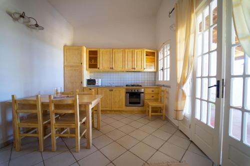 Kuchyň nebo kuchyňský kout v ubytování Residence Isola dei Mori