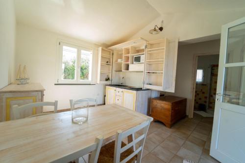 Kuchyň nebo kuchyňský kout v ubytování Residence Isola dei Mori