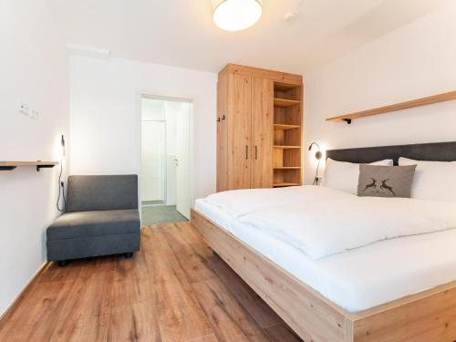 Postel nebo postele na pokoji v ubytování Falken Suites TOP 4