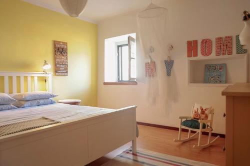 Postel nebo postele na pokoji v ubytování Casa do Vale -Villa Rio Minho-Seixas-Caminha