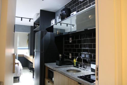 Dapur atau dapur kecil di Studio moderno e aconchegante - Perdizes