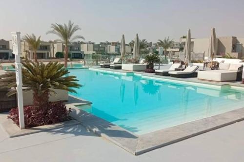 Πισίνα στο ή κοντά στο Ultimate Boho Chalet w Garden in Azha - Sokhna