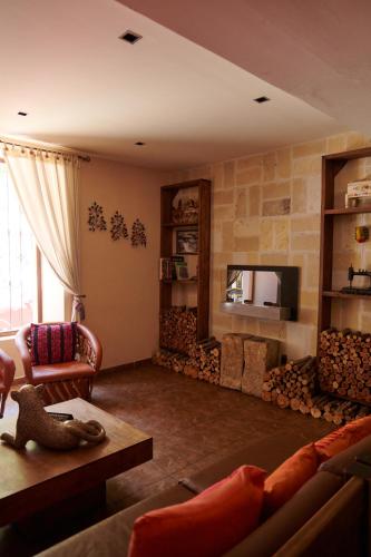 Μια τηλεόραση ή/και κέντρο ψυχαγωγίας στο Hotel Mansion Del Valle