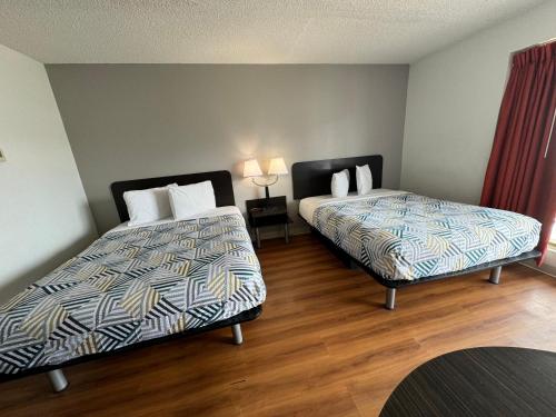 Ένα ή περισσότερα κρεβάτια σε δωμάτιο στο Motel 6-Butte, MT - Historic City Center