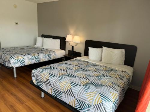 Ένα ή περισσότερα κρεβάτια σε δωμάτιο στο Motel 6-Butte, MT - Historic City Center