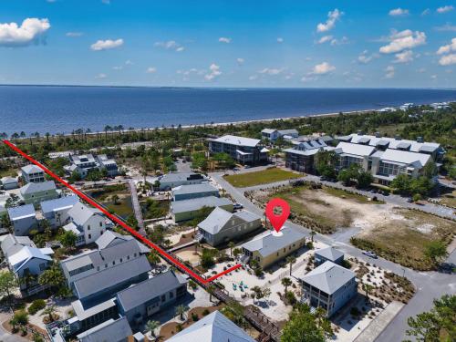 an aerial view of a resort with a red marker at Half Shell Hideaway in Port Saint Joe