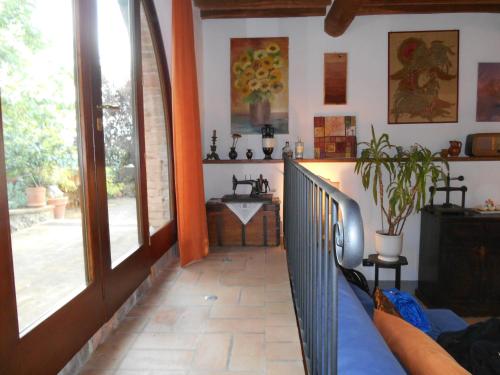 a hallway of a house with a sink in it at Podere Sammonti in Monteriggioni