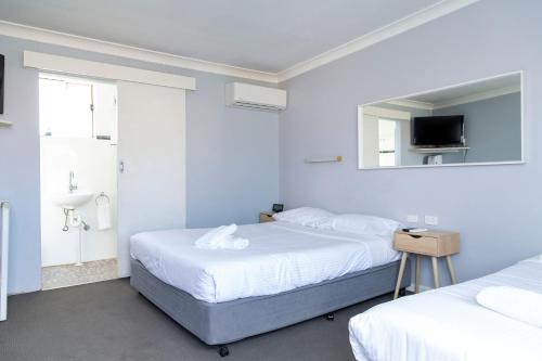Postel nebo postele na pokoji v ubytování Australian Hotel Motel Yass