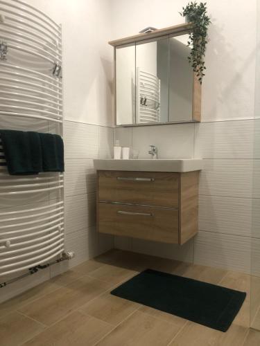 Ένα μπάνιο στο Traumhaftes Studioappartement