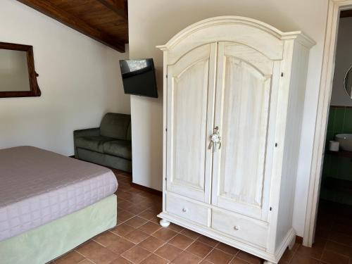 Un ou plusieurs lits dans un hébergement de l'établissement Il Vigneto di Nonno Pietro
