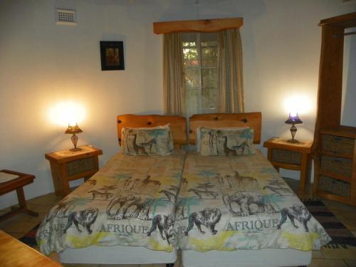 เตียงในห้องที่ Lake St Lucia Lodge